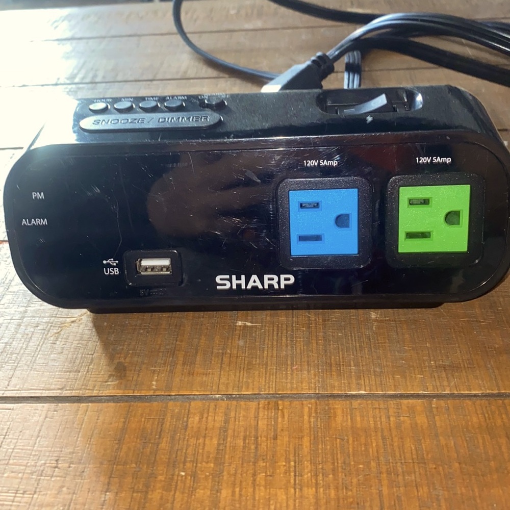 Alarm clock with plug-in